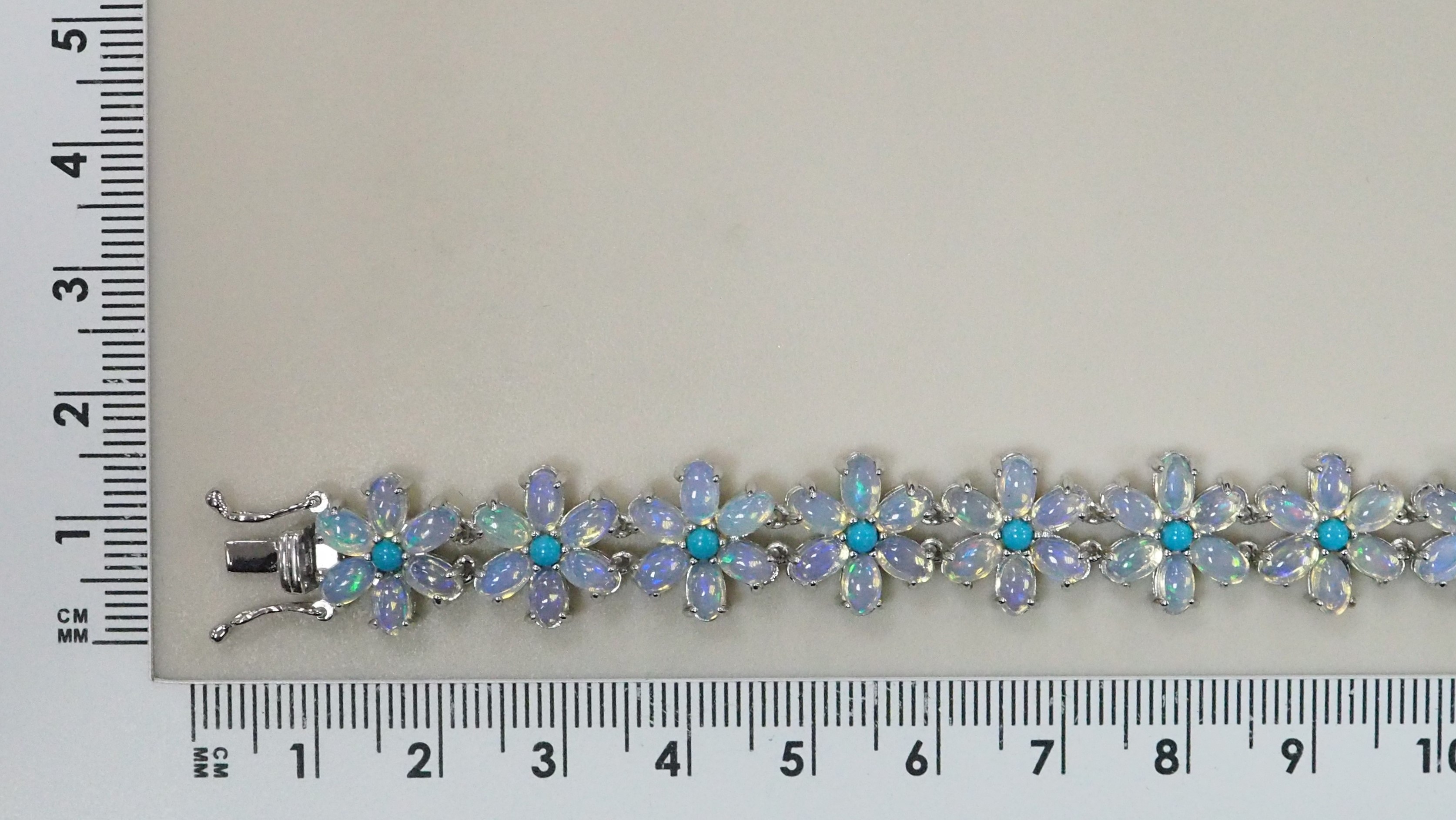 Серебряный браслет с бирюзой и опалами "Цветы"